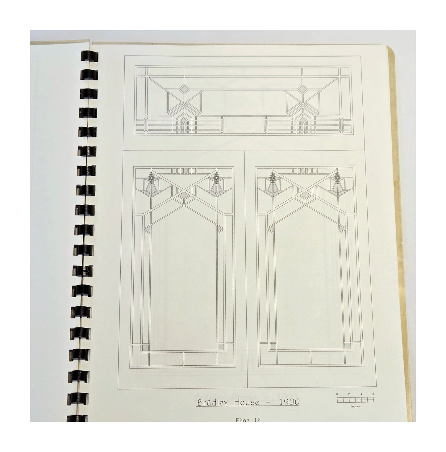 Frank Lloyd Wright Stained Glass Book. Vintage Used from 1994. Patterns Good Condition. Outer Plastic front cover is yellowed. Lovely Architectural book of window patterns.