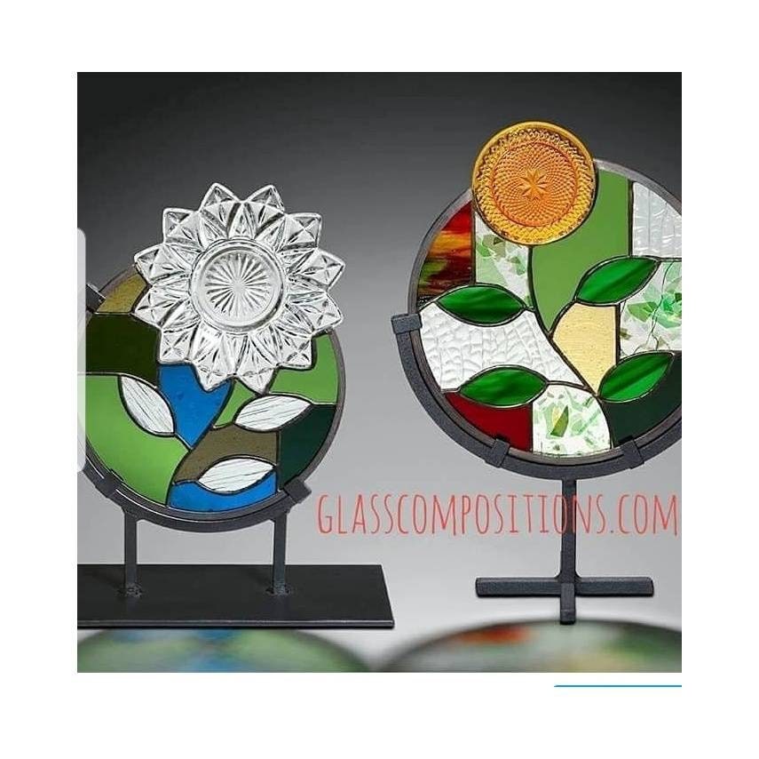 Stained glass Scalloped vintage clear saucer. Green, blue & gray colors pop in a black metal stand. 12"tall x 9"wide Table top centerpiece
