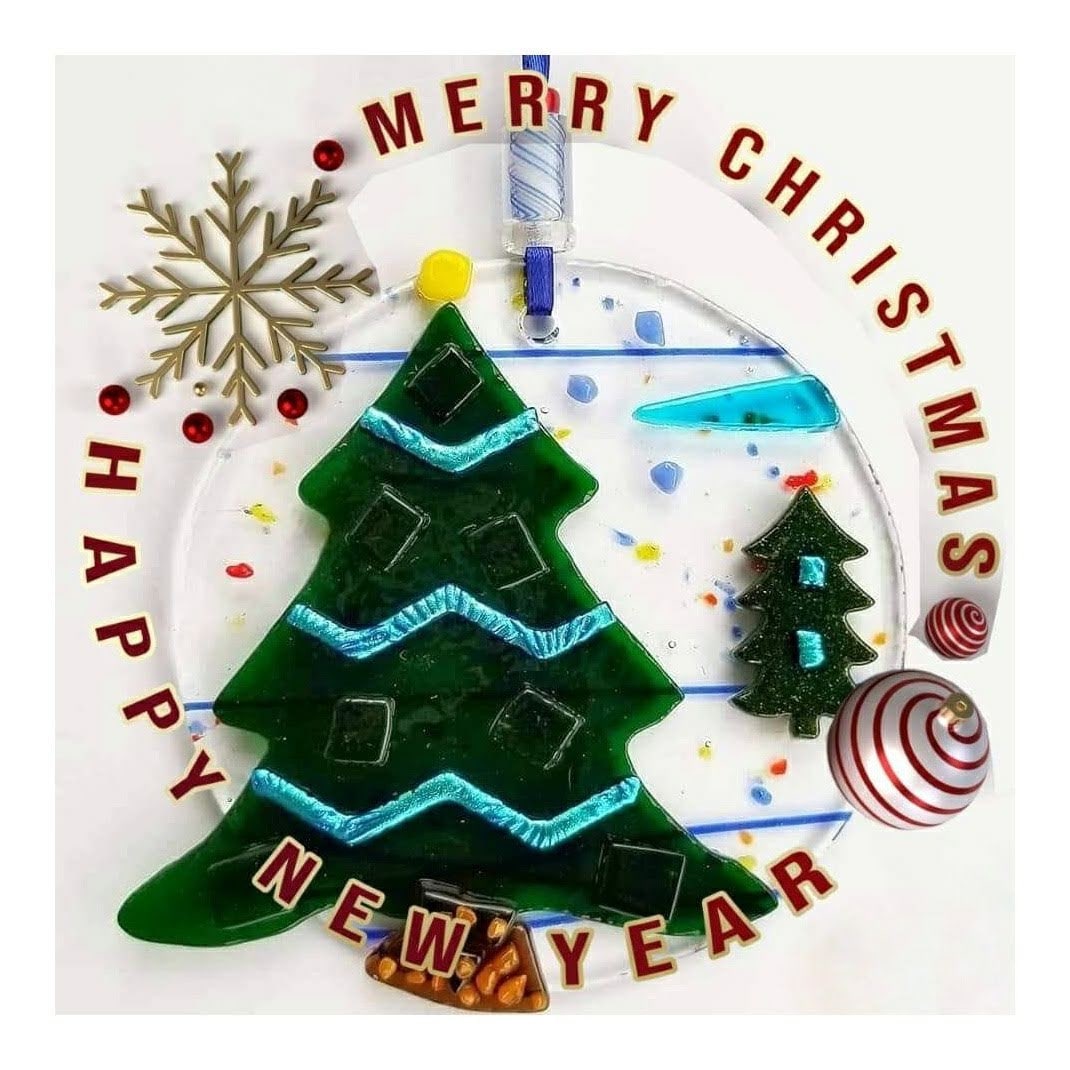 Fused Glass Tree, Hanging Ornament. An array of Pinks, Greens with Dichroic & Crushed glass. Lots of little details. Find the snowflakes.