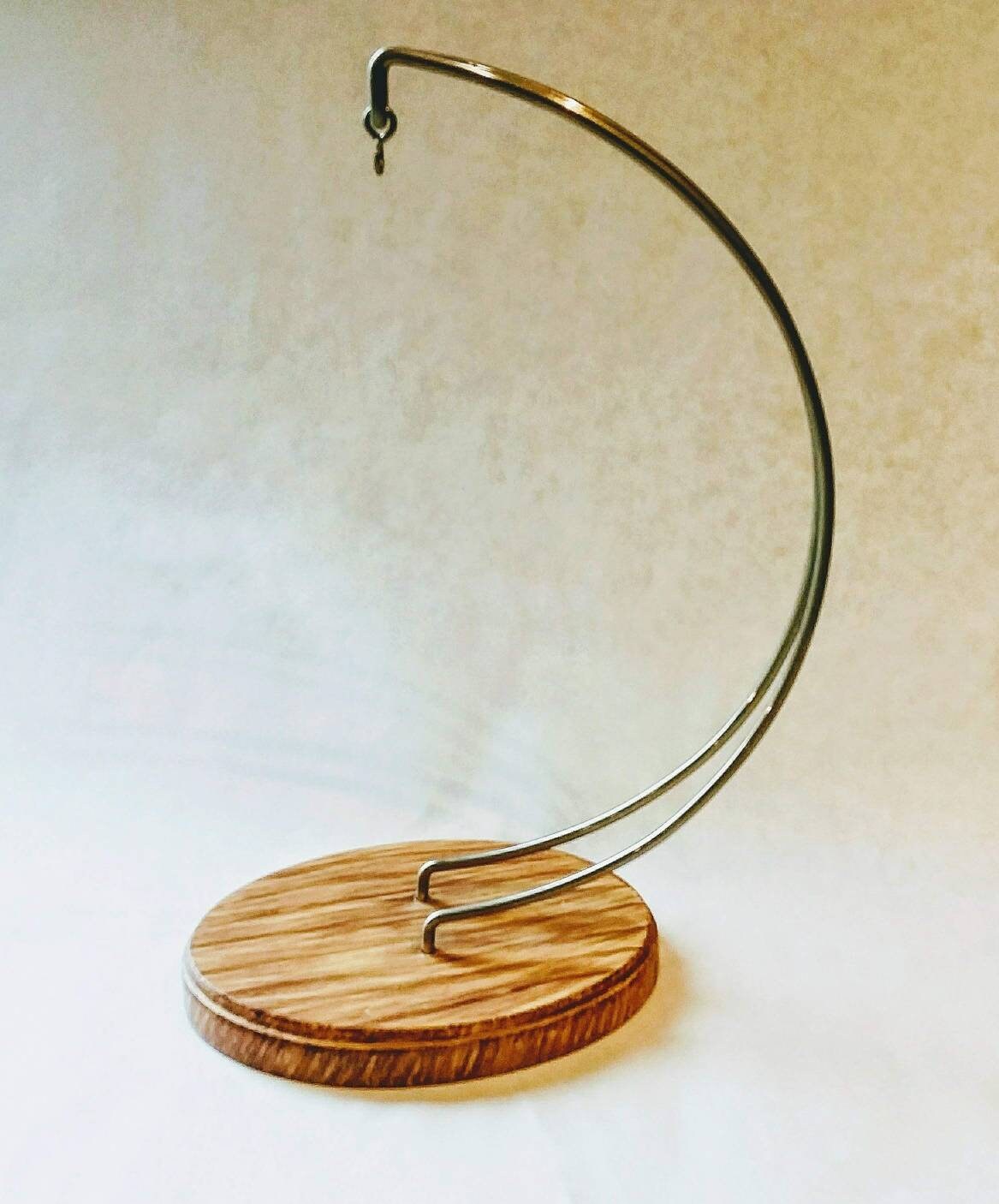 Ornament holder. Display stand for stained glass. Hang blown glass or suncatchers. Paintable with sturdy base. Terrarium globe stand.