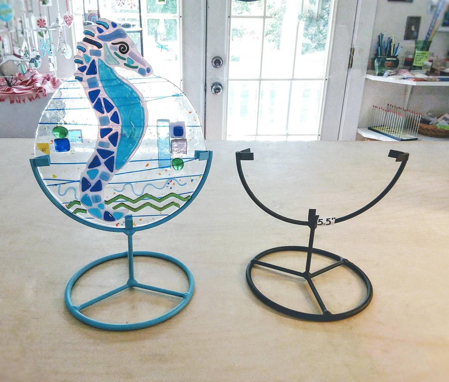 Black metal display stand for Tiles, Stained or Fused Glass Art. Holds square bottomed artwork 5" to 5.25" wide. Black frame, heart holder.