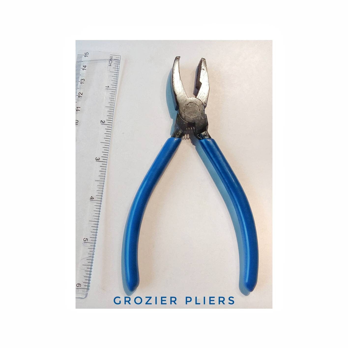 Stained Glass Pliers, Grozer for Shaping Glass Along Score. Nippers, Serrated jaw to nibble edges. Sturdy metal with red coated handles.
