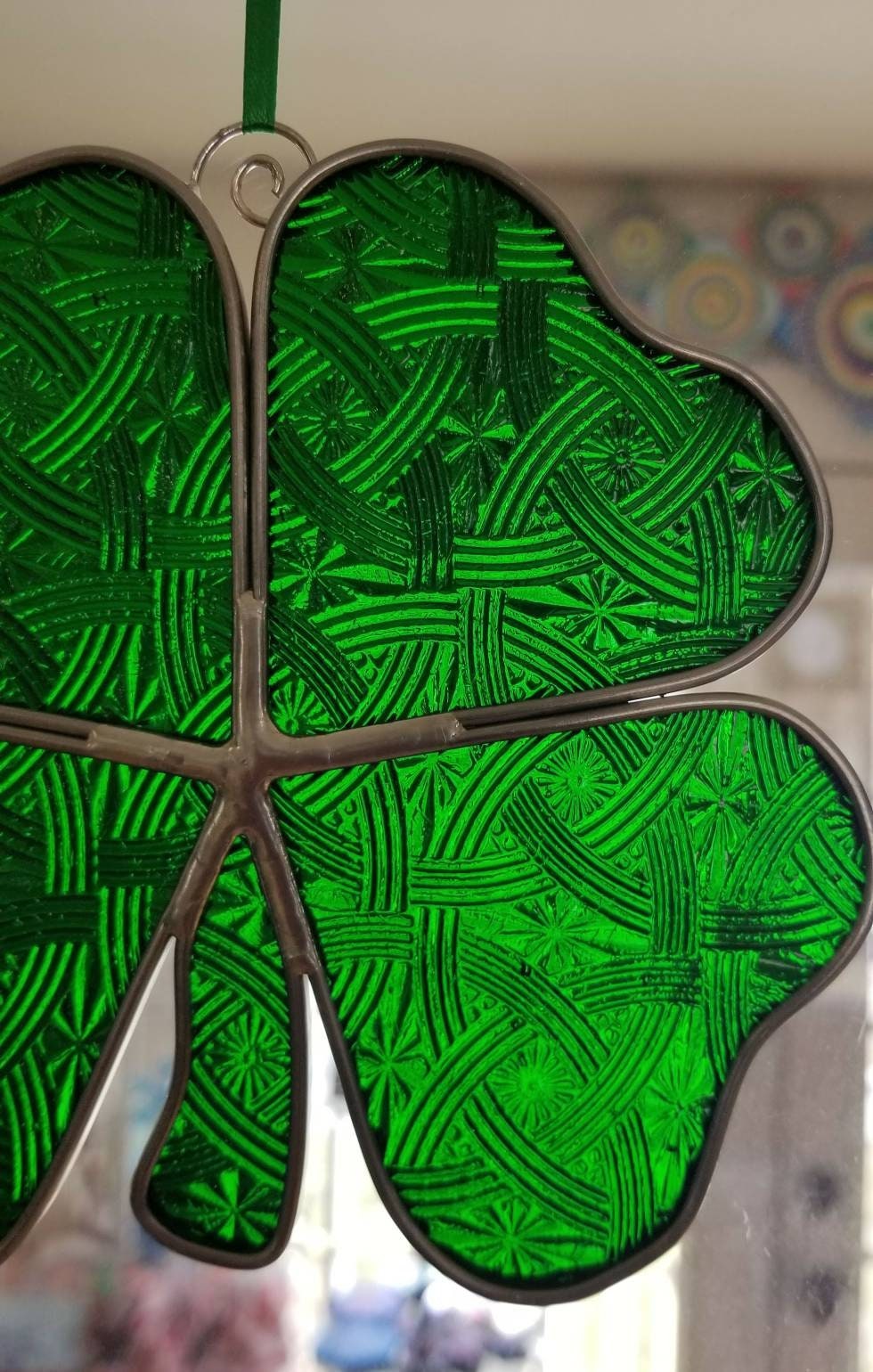 Four Leaf Clover, Window Hanging, Sparkly Green Glass with Repeating Celtic Knots are Textured into the Stained Glass.