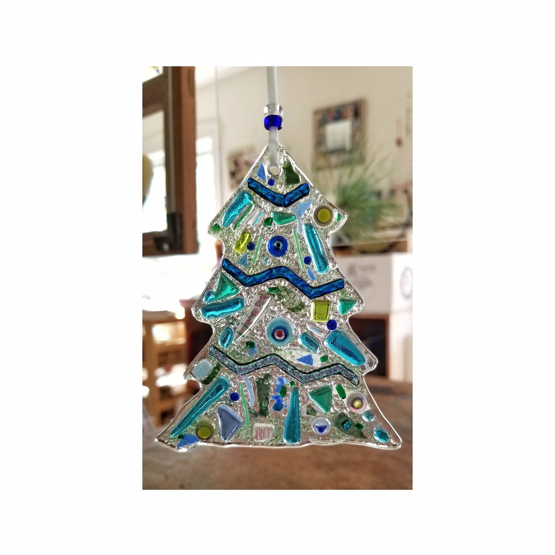 Fused Glass Tree Suncatcher Hanging. An array of Blue Green Color with Dichroic & Crushed glass. Lots of little details. Find the butterfly.